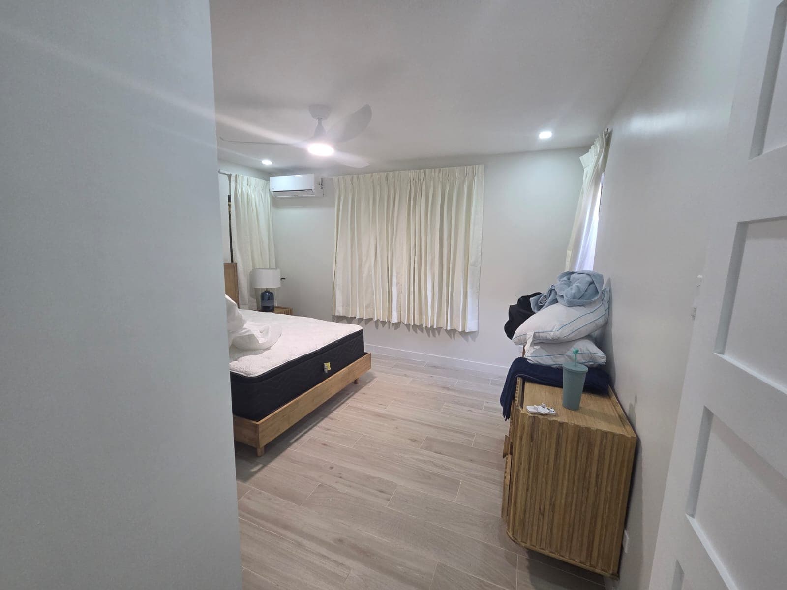 Bedroom with ceiling fan, nearing completion