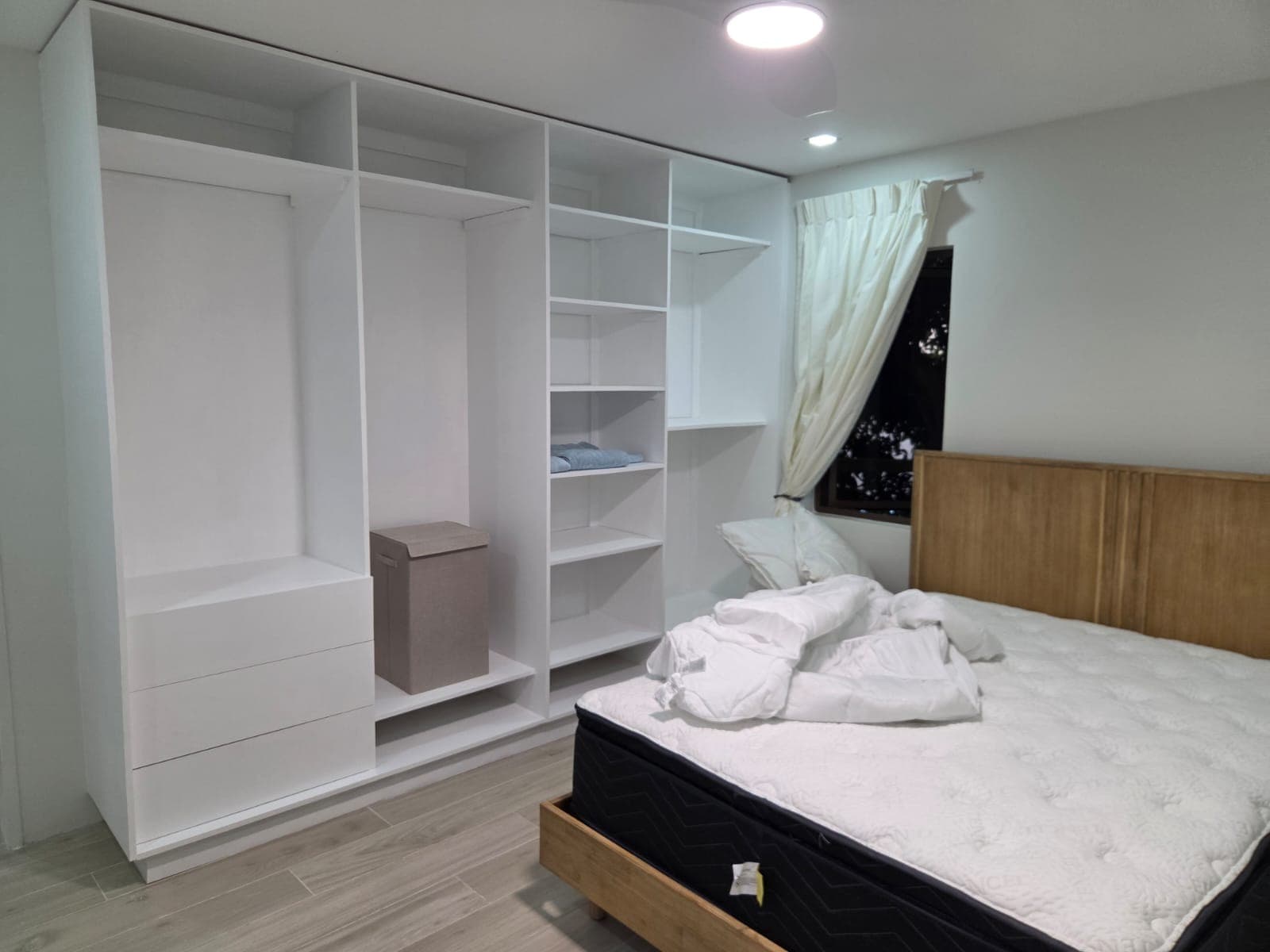 Built-in closet and bedroom detail, evening lighting