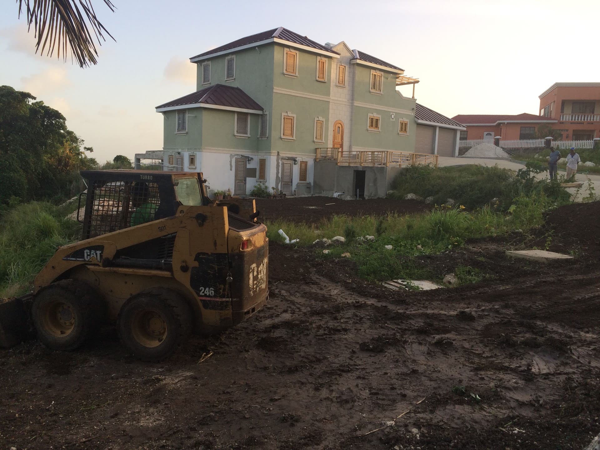 Residence and graded site prepared for landscaping, tracked and reported to the owner remotely