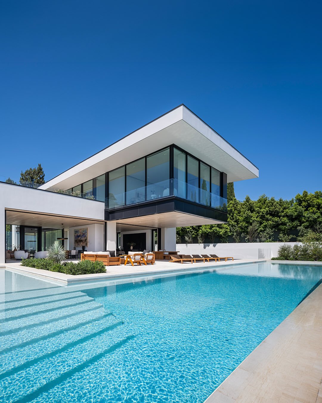 Architectural rendering of a proposed design-build residence with pool terrace, design concept only