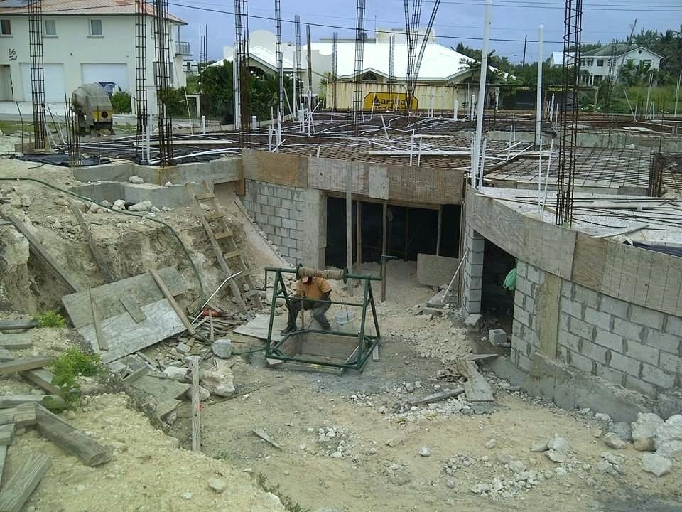Actual construction photograph: curved blockwork foundation, alternate angle