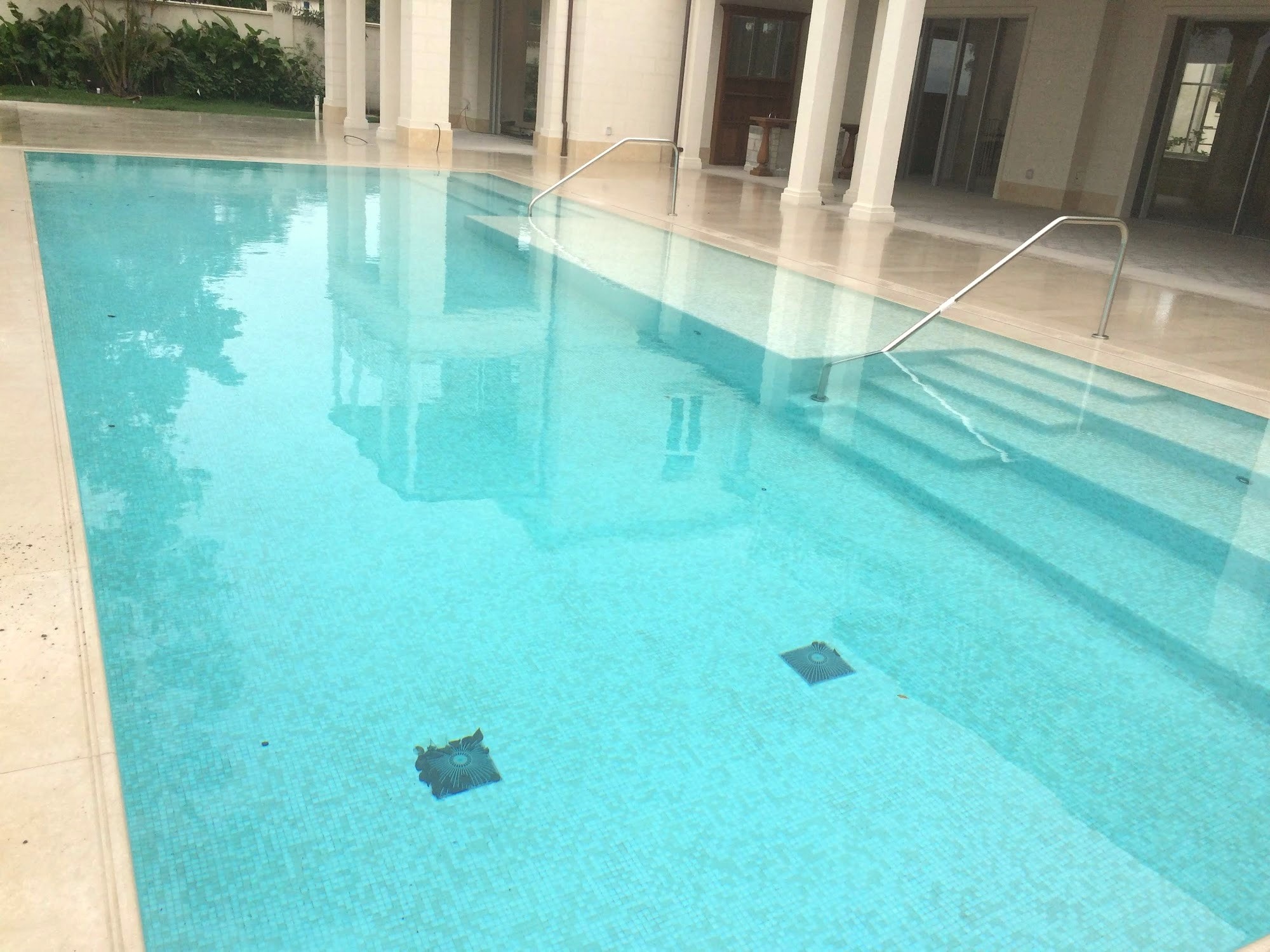 Infinity-edge pool with terrace steps, close view