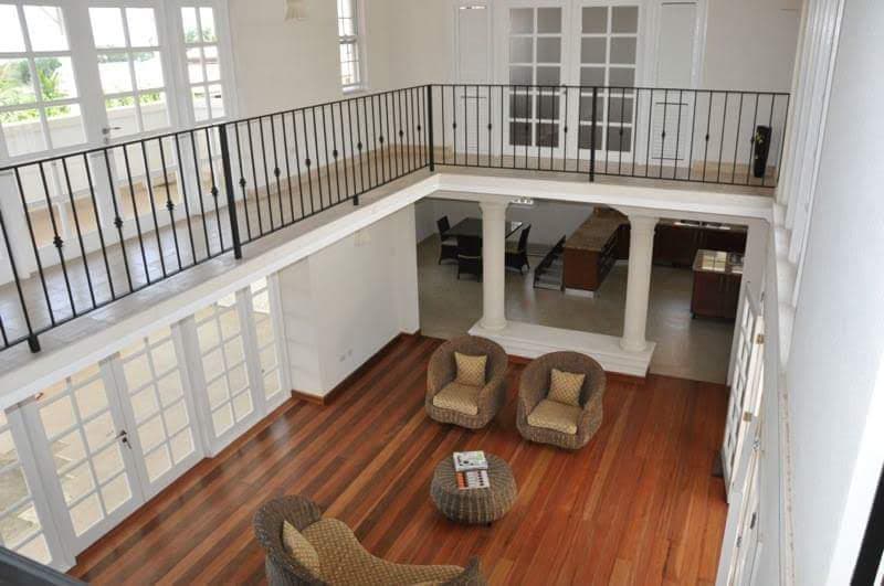 Mezzanine level overlooking living and dining area below